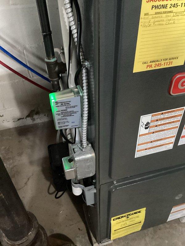 Completed annual cooling system maintenance on EnergiAir unit (Model WT 03-2035). Performed comprehensive inspection of air handler and associated components, checked refrigerant lines, verified electrical connections and safety controls, and documented equipment condition with photos. All systems operating within normal parameters upon completion of tune-up procedures.