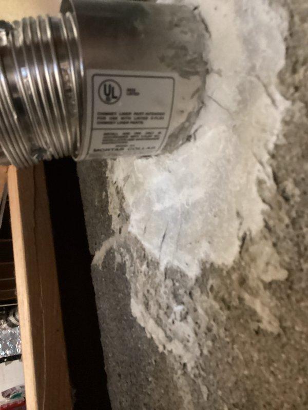 Conducted water heater estimate and site assessment for residential installation. Evaluated existing gas water heater with copper piping connections and metallic venting system in basement utility area, documented equipment specifications and installation conditions including concrete floor placement and surrounding infrastructure. Photographed current setup and mechanical components to provide accurate replacement recommendations.