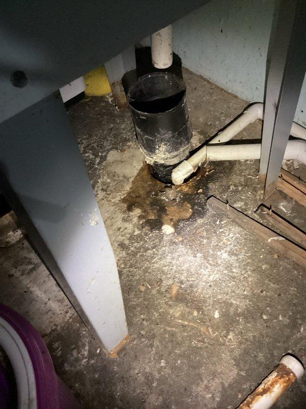 Completed annual cooling maintenance on a 14-year-old EnergiAir system. Inspection revealed significant corrosion and rust staining on condensate drain piping and surrounding floor area, indicating ongoing moisture issues requiring monitoring. All system components were inspected, cleaned, and tested for proper operation per manufacturer specifications.