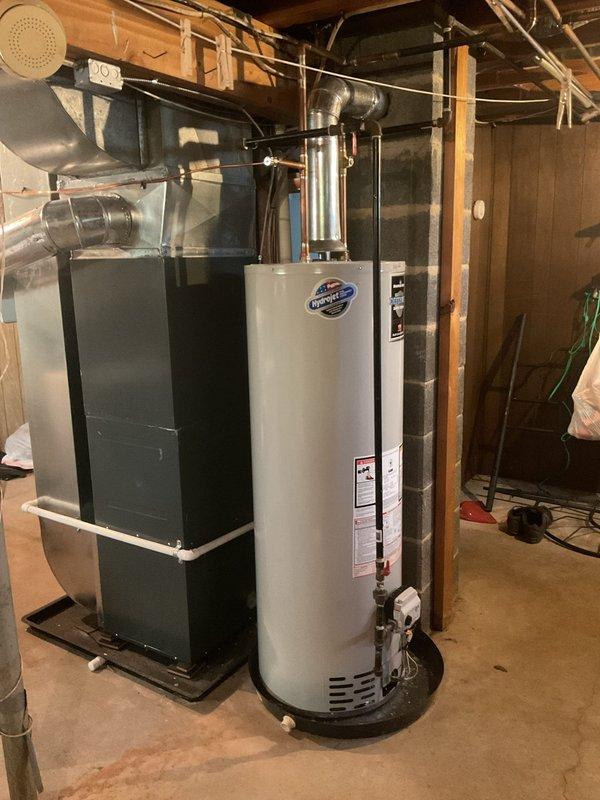 Responded to service call for 19-year-old Bradford White natural gas water heater with pilot light repeatedly extinguishing, requiring customer to relight unit two to three times weekly. Inspected thermocouple, pilot assembly, and gas control valve; documented unit condition and specifications including 40,000 BTU/hr rating and natural gas configuration. Advised customer of unit's age and declining reliability, recommending replacement due to repeated pilot failures indicating thermocouple or gas valve deterioration common in units approaching end of service life.