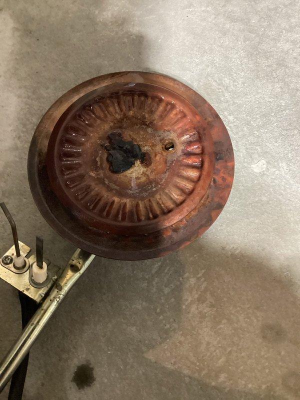 # Water Heater Replacement

Removed and replaced failed residential water heater system. Disconnected existing unit including all water supply lines, gas connections, and venting components. Installed new Lochinvar high-efficiency water heater with proper clearances per manufacturer specifications. Connected copper supply piping with brass fittings and installed code-compliant drain pan beneath unit. Secured black pump/motor assembly at top of tank and verified all plumbing connections for leaks. Tested temperature and pressure relief valve operation. Verified proper gas flow and ignition sequence. System commissioned and operational upon completion.