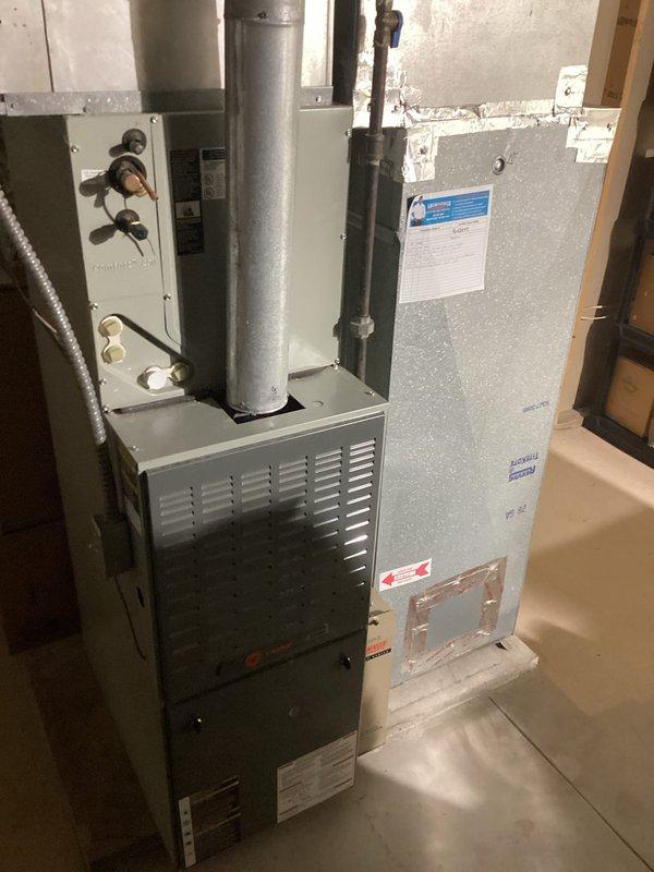 Completed annual heating maintenance on 10-year-old Trane furnace system. Performed comprehensive tune-up including inspection of all operational components, burner assembly cleaning, heat exchanger examination, blower motor lubrication, air filter replacement, and combustion analysis to ensure safe and efficient operation. Verified proper system function and confirmed unit is operating within manufacturer specifications for the upcoming heating season.