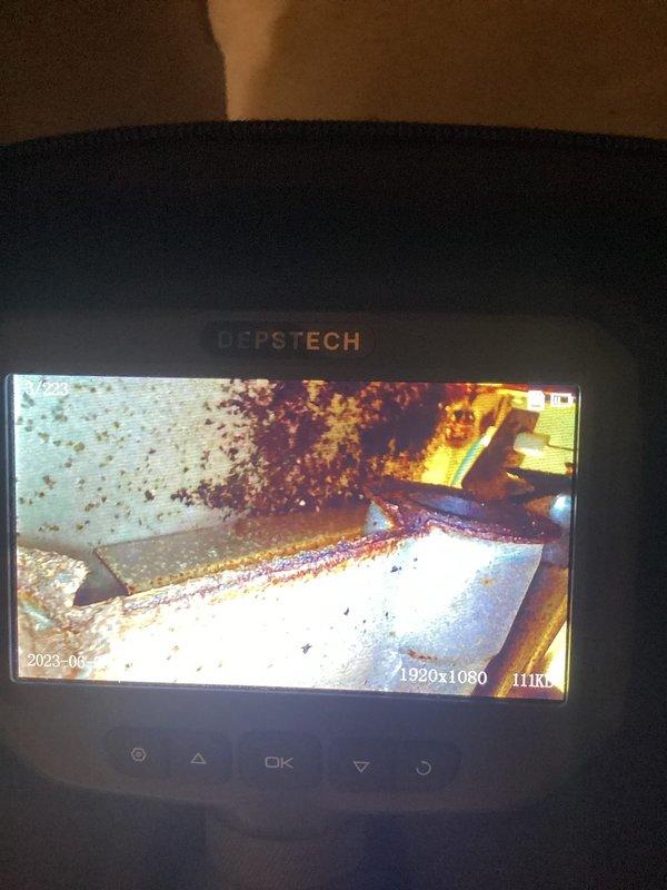 Completed annual heating maintenance on 20-year-old Lennox system. Performed comprehensive inspection using camera equipment to examine internal ductwork and heat exchanger components. Camera inspection revealed deteriorated surfaces with visible debris accumulation in confined areas of the system. Documented condition of interior components including areas showing wear and particulate matter buildup. All findings photographed for record-keeping purposes. System operational at time of departure.