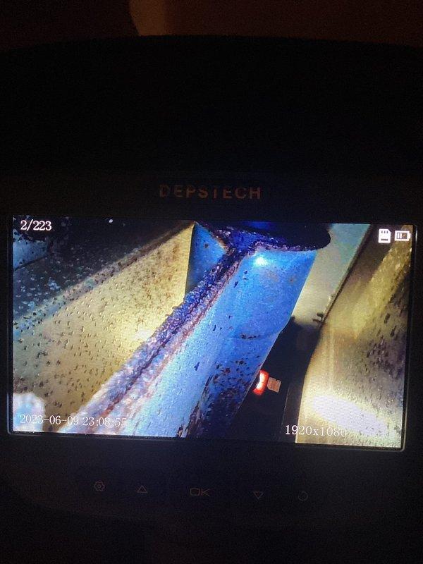 Completed annual heating maintenance on 20-year-old Lennox system. Performed comprehensive inspection using camera equipment to examine internal ductwork and heat exchanger components. Camera inspection revealed deteriorated surfaces with visible debris accumulation in confined areas of the system. Documented condition of interior components including areas showing wear and particulate matter buildup. All findings photographed for record-keeping purposes. System operational at time of departure.