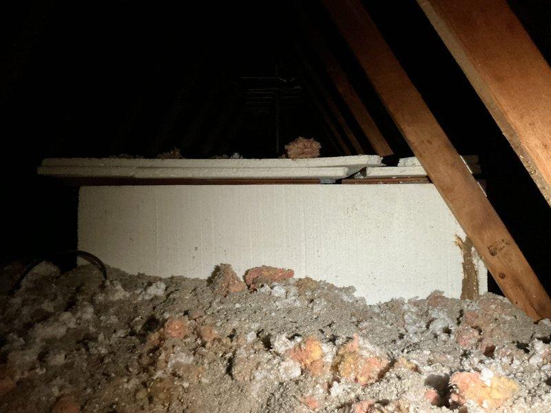 Performed thorough inspection of attic fan system including electrical switch box installation and attic-mounted fan unit. Examined switch mounting hardware, wiring connections, and operational functionality. Assessed attic fan installation, surrounding insulation condition, and verified proper ventilation system operation.