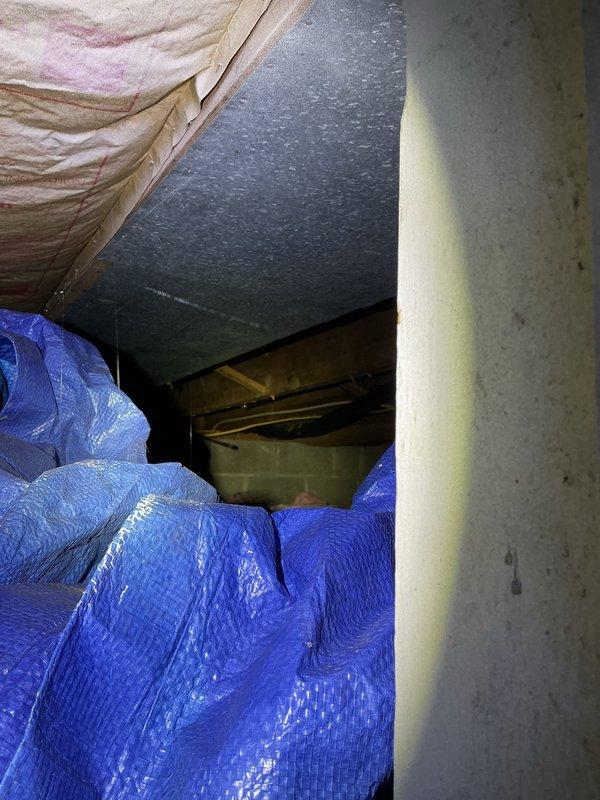 Responded to repeat leak on exterior water line at previously repaired location. Accessed crawl space through side entry to inspect supply line routing and identify source of recurrent failure. Repaired leaking water line connection at exterior hose bib, ensuring proper seal and connection integrity to prevent future failure at same location.