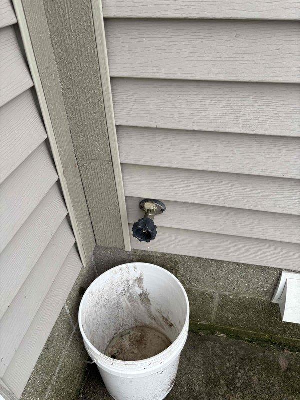 Responded to emergency plumbing call for exterior hose bib that was continuously leaking and would not shut off. Upon arrival, assessed the faulty outdoor faucet mounted on the side of the building and determined the valve mechanism had failed, preventing proper water shutoff. Completed necessary repairs to stop the active leak and restore proper function to the exterior water spigot, eliminating water waste and preventing potential foundation damage from continuous water discharge.