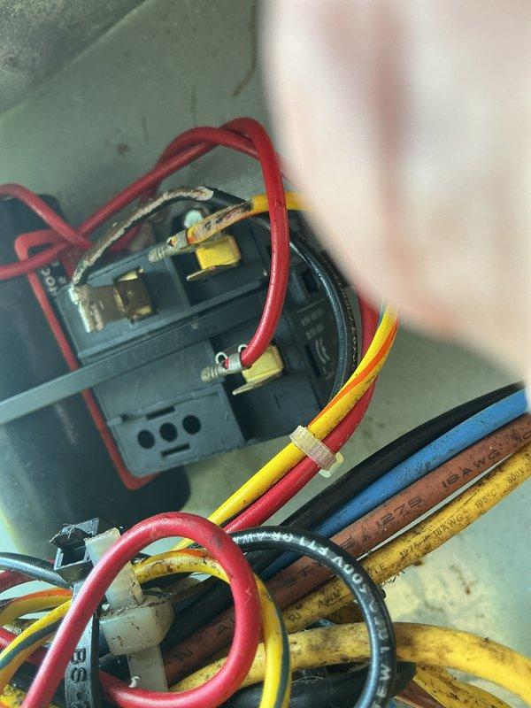 # Cooling System Restoration - Tripped Breaker

Responded to a no-cooling call on a 12-year-old Carrier air conditioning system that had tripped the electrical breaker. Upon arrival, confirmed the outdoor condensing unit was not operating and the associated circuit breaker had tripped to the off position.

Performed visual inspection of the outdoor unit's electrical components, focusing on the contactor, capacitor, and associated wiring connections. Examined all wire terminations for signs of overheating, loose connections, or damage that could have caused the overcurrent condition. Inspected the compressor contactor for pitting, wear, or failure that would create a short circuit or excessive current draw.

Checked the dual run capacitor for bulging, leakage, or failure, as capacitor failure is a common cause of increased amperage draw leading to breaker trips. Verified all electrical connections at the unit's terminal block were secure and properly torqued. Examined the condition of t