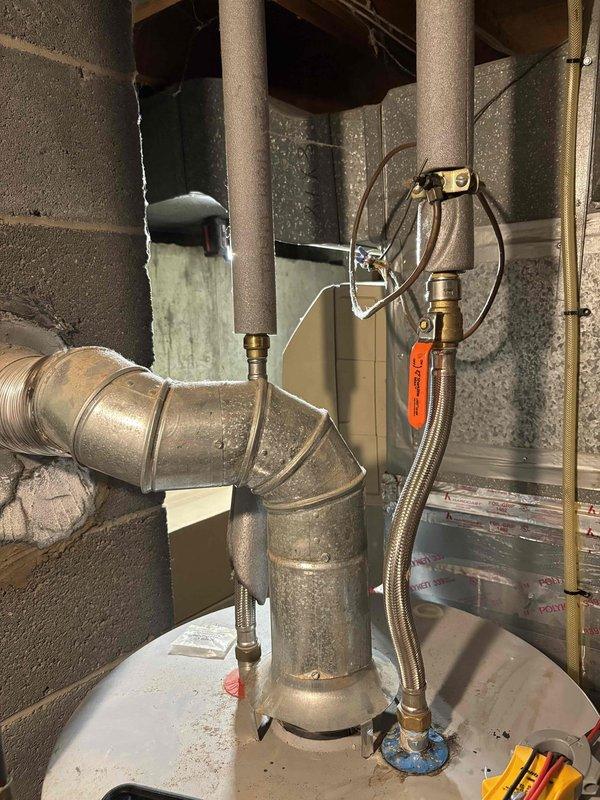 # HUM-Humidifier Problem

Responded to service call for humidifier running constantly on Lennox unit approximately fifteen years old. Upon inspection, found aging humidifier control system failing to properly cycle with heating system operation. Evaluated humidifier saddle valve, water supply line with braided stainless steel flex connector, and humidifier pad condition. Verified HVAC air handler and ductwork connections were secure and functioning properly. Documented existing equipment configuration with photos showing galvanized air handler unit, insulated ductwork, and humidifier assembly mounted to supply plenum. Assessed humidifier solenoid valve operation and water flow control mechanism. Due to age of unit and continuous operation issue, recommended humidifier replacement to restore proper humidity control and prevent potential water damage or system inefficiency. System heating function confirmed operational throughout inspection.