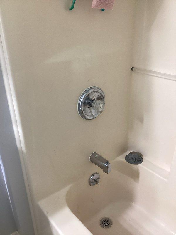 Responded to multiple plumbing concerns in residential bathroom. Addressed broken sink stopper mechanism in bathroom lavatory. Investigated and diagnosed unusual noise occurring during shower operation that persisted for approximately 20 seconds after turning on water supply. Inspected toilet tank components and identified slow fill issue caused by fill valve requiring adjustment. Examined fill valve assembly, float mechanism, and water supply line connections. Made necessary adjustments to optimize toilet tank fill rate and restore proper operation. Verified all fixtures functioning correctly upon completion. Documented conditions with photographic evidence showing toilet tank internal components and shower/tub fixture assembly.