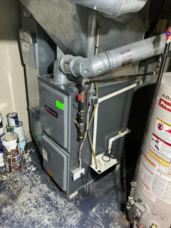 Conducted site assessment for complete AC system replacement at residential property. Evaluated existing outdoor condenser unit and indoor furnace system, documented current equipment configuration including electrical connections, ductwork layout, and water heater proximity for replacement planning. Provided comprehensive estimate for new HVAC system installation based on existing infrastructure and customer requirements.