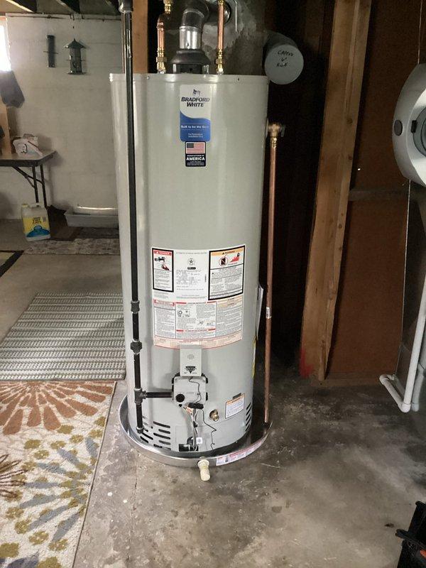 Responded to service call for water heater alarm meter box that had detached from newly installed Bradford White unit (Model WT-4-2036). Upon arrival, inspected the 0-year-old water heater installation and assessed the condition of the alarm monitoring system. Reattached and secured the alarm meter box to ensure proper functionality and monitoring of the water heater operation. Verified all connections, tested alarm system operation, and confirmed unit was functioning correctly with all safety devices properly installed and operational.