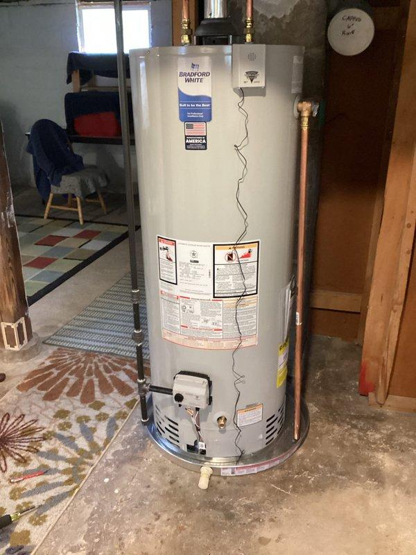 Responded to service call for water heater alarm meter box that had detached from newly installed Bradford White unit (Model WT-4-2036). Upon arrival, inspected the 0-year-old water heater installation and assessed the condition of the alarm monitoring system. Reattached and secured the alarm meter box to ensure proper functionality and monitoring of the water heater operation. Verified all connections, tested alarm system operation, and confirmed unit was functioning correctly with all safety devices properly installed and operational.