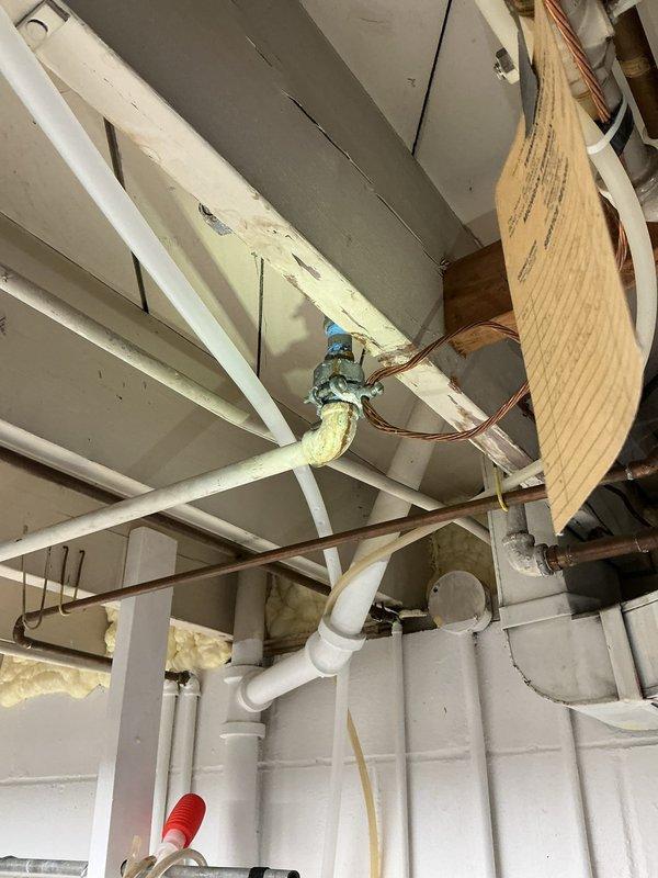 Responded to service call for garbage disposal malfunction caused by seed obstruction preventing unit operation. Accessed disposal unit, removed lodged seed material from grinding chamber, and verified proper motor function and blade rotation. Tested disposal under running water to confirm full operational restoration and proper drainage flow through system.