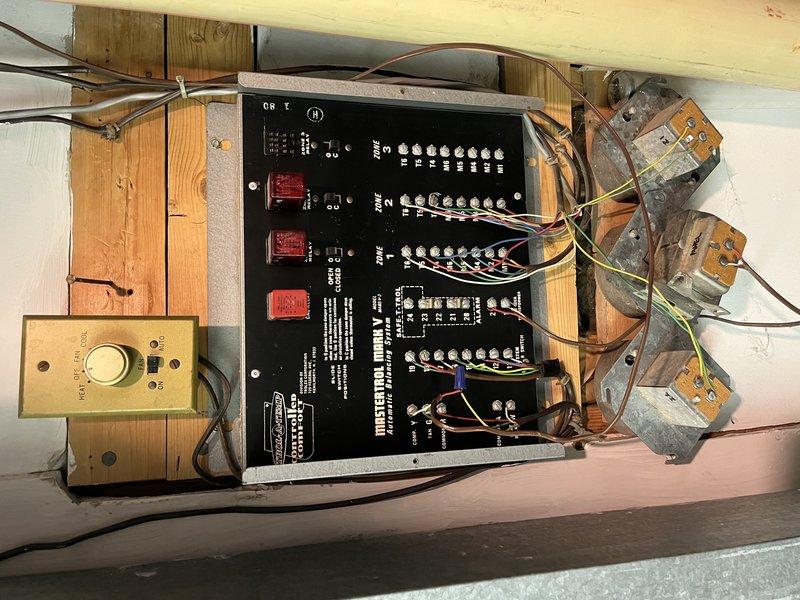 Responded to no-cooling complaint on upstairs zone following recent tune-up on 2-year-old ICP system. Upon arrival, inspected Mastrol Mark V automatic balancing system with Honeywell Controlled Comfort zoning control panel. Found Zone 2 damper actuator had failed to respond to thermostat call, preventing airflow to upstairs area. Verified proper 24V power supply to zone control board and tested all three zone damper positions. Discovered damper motor for affected zone had lost communication with control module. Checked all terminal connections on zone panel, confirmed proper wiring at T-terminals and M-terminals, and verified transformer output voltage. Cycled zone switches and tested each zone independently to isolate the issue. Reset control board and recalibrated damper positions, restoring proper operation to all zones including the previously non-functional upstairs zone. Confirmed adequate airflow and proper damper movement through all zones during system operation. System tested