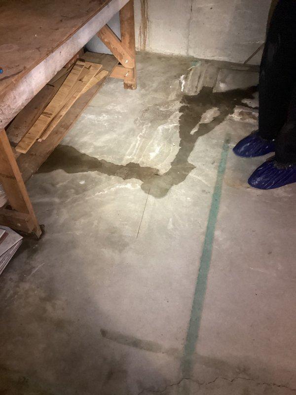 Returned to property to complete quoted repair work on water heater system. Successfully replaced defective gas valve and installed new temperature relief valve to restore safe operation of the unit. Coordinated entry access through neighbor as homeowners were traveling. Documentation photos captured existing water damage conditions in basement area, including significant moisture staining on concrete floor and vertical water staining on wall surfaces, indicating separate ongoing moisture intrusion issues requiring future attention. Water heater repairs completed successfully and system returned to proper working order.