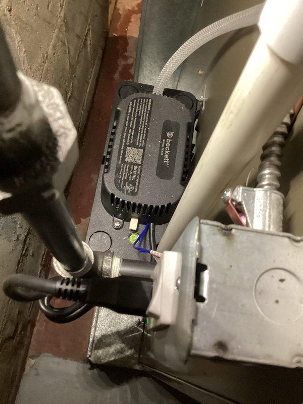 Completed annual cooling maintenance on 0-year-old Carrier unit model WT 03-2031. Performed comprehensive system inspection including electrical components, capacitors, and control board mounted in basement utility area. Verified all wiring connections secure, checked capacitor operation, and confirmed proper routing of electrical conduit and refrigerant lines. System tested and operating within normal parameters. Documentation photos captured for service records.