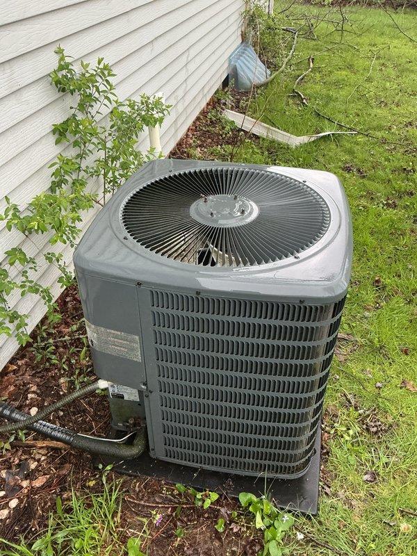 Completed annual cooling maintenance on 8-year-old residential air conditioning system. Performed comprehensive tune-up including inspection of outdoor condenser unit, verified proper electrical connections at disconnect box, checked refrigerant levels, cleaned condenser coils, and tested system operation. Unit operating within normal parameters with no immediate service needs identified.