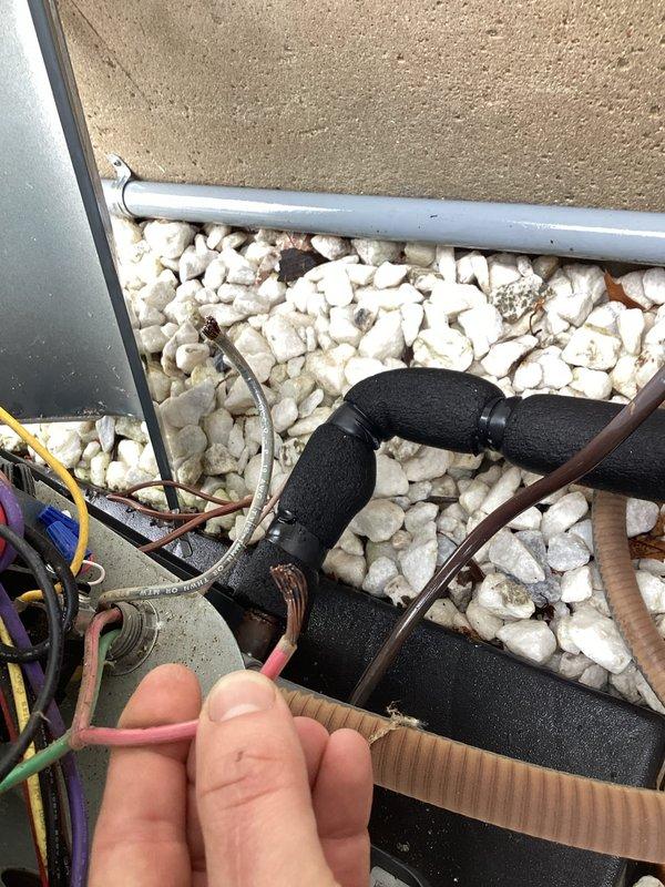 Completed annual cooling maintenance on 2023 air conditioning system. Performed comprehensive tune-up including inspection of outdoor condensing unit, refrigerant line connections, electrical components, and control panel wiring. Verified proper operation of contactor, checked all wire connections for tightness and security, and inspected copper refrigerant lines and service ports. All components found in good working condition with no issues identified. System operating efficiently and ready for cooling season.