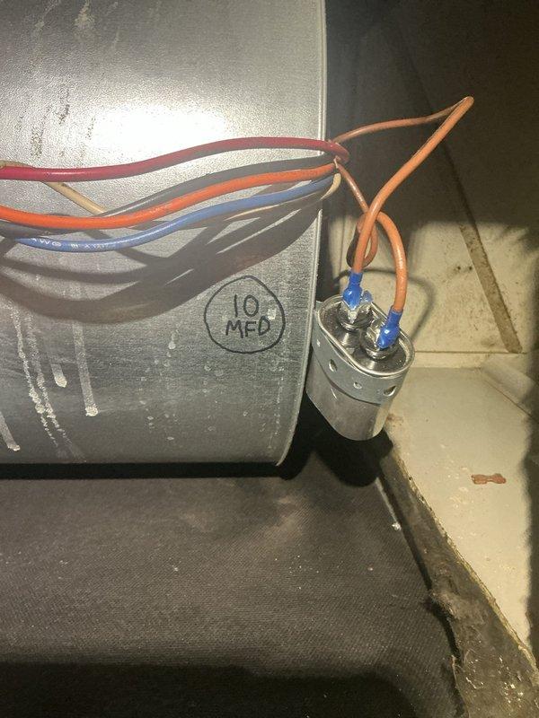 # ASTU-AC Super Tune-Up Completed

Performed comprehensive super tune-up service on a 5-year-old air conditioning system. Conducted thorough inspection of all major components including the outdoor condensing unit and indoor air handler assembly. Examined and tested the run capacitor, verified proper electrical connections with multi-colored wiring harness, and confirmed secure terminations at all connection points. Inspected condensate removal system including the condensate pump with reservoir and motor assembly, verified proper drainage through PVC discharge piping, and confirmed pump operation. Cleaned accessible components, checked refrigerant pressures, tested system operation through complete cooling cycle, and verified all safety controls. System operating within manufacturer specifications with no issues identified. All electrical components showing normal wear consistent with age. Condensate management system functioning properly with clear drain lines. Unit left in excellent