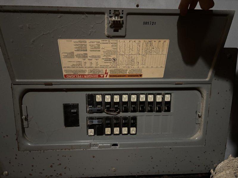 Conducted on-site assessment for water heater replacement of existing 35-year-old unit. Inspected electrical panel to verify circuit capacity and breaker configuration for new installation, documented existing electrical infrastructure and access points within wall cavity near installation area. Provided estimate for complete water heater replacement with customer-supplied equipment.