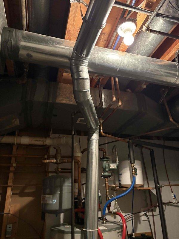 Responded to service call regarding suspected improper venting termination in attic space discovered during roofing work. Inspected 13-year-old Carrier system and traced HVAC ductwork and venting configuration from mechanical room through attic space. Confirmed vent pipe termination location, documented installation with photos, and provided customer with corrective options to bring venting into compliance with proper exhaust termination requirements outside the building envelope.