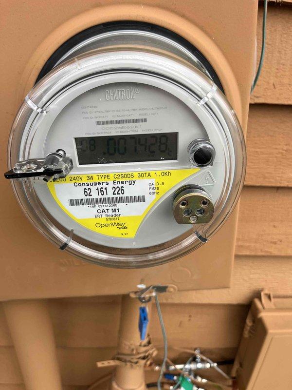 Performed generator estimate for residential property with 2016-era electrical infrastructure. Documented existing electrical service configuration including Centron smart meter (OpenWay CAT M1) with 240V 3W Type G290DS specifications and main circuit breaker panel installation. Photographed utility meter location, service entrance components, and electrical panel to assess compatibility and determine proper generator sizing requirements. Evaluated existing electrical distribution system capacity and panel configuration to develop comprehensive whole-house generator installation proposal.