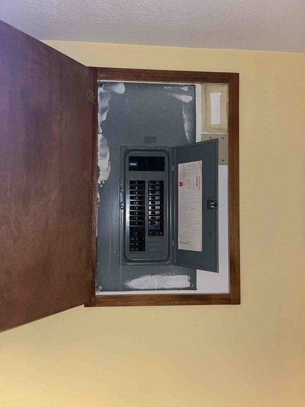 Performed generator estimate for residential property with 2016-era electrical infrastructure. Documented existing electrical service configuration including Centron smart meter (OpenWay CAT M1) with 240V 3W Type G290DS specifications and main circuit breaker panel installation. Photographed utility meter location, service entrance components, and electrical panel to assess compatibility and determine proper generator sizing requirements. Evaluated existing electrical distribution system capacity and panel configuration to develop comprehensive whole-house generator installation proposal.