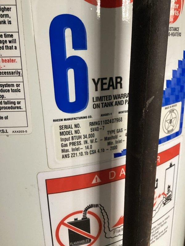 Completed rental inspection of HVAC system and water heater. Documented 9-year-old furnace/air handler unit with proper PVC venting and insulated ductwork, and 15-year-old Rheem 40-gallon gas water heater (Model 5V40-7, 34,000 BTU input) with 6-year limited tank warranty. Both units photographed showing manufacturer labels, serial numbers, and current operational configuration for rental property documentation purposes.