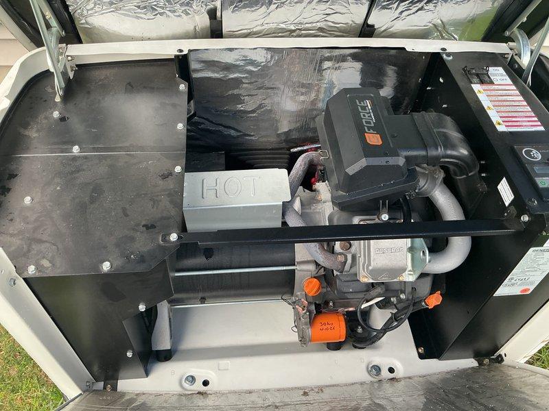 Completed comprehensive 5-year tune-up service on Generac generator unit. Performed standard maintenance protocol including inspection of all major components, motor assembly, and associated mechanical systems. Observed significant water accumulation in condensate collection area with orange safety switch visible among drainage components. Inspected Gould-branded motor unit, copper piping connections with protective caps, heating elements, and associated plumbing connections. Verified all specification labels and compliance plates remain legible and properly affixed. Unit exterior and accessible components showed good overall condition with no major deterioration noted. All standard maintenance tasks completed per manufacturer specifications for 5-year service interval.