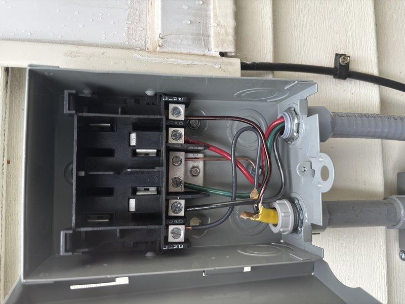 Completed full HVAC system installation including new furnace, air conditioning system, and water heater at residential property. Installed outdoor AC disconnect box with proper electrical connections and conduit routing on exterior wall, and mounted electrical service panels in basement utility area with appropriate circuit protection and wiring. All equipment installed per manufacturer specifications, electrical connections verified, and systems tested for proper operation.