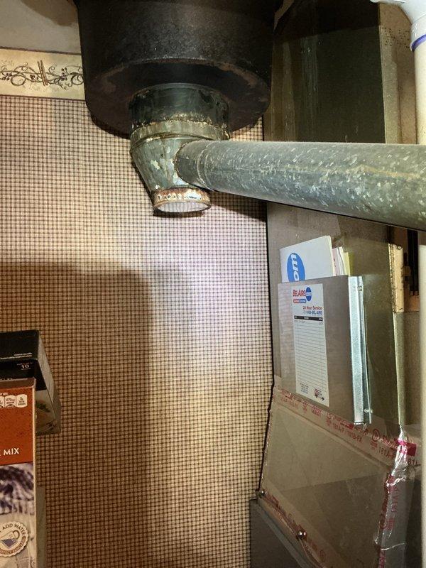 Responded to no heat call on 4-year-old Lennox furnace that stopped operating following a storm. Customer reported sensor blinking and suspected system may have tripped due to weather event affecting chimney with newly installed roof. Upon inspection, identified flame sensor as cause of system lockout. Removed and inspected flame sensor, which showed carbon buildup and contamination preventing proper flame detection. Cleaned flame sensor rod thoroughly to restore proper conductivity and reinstalled component. Cycled system through multiple heating cycles to verify proper ignition sequence and flame sensing operation. Confirmed furnace returned to normal operation with no fault codes present. System now heating properly with all safety controls functioning as designed.