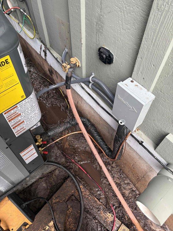 Completed full system replacement of residential furnace and air conditioning unit. Indoor furnace installed in basement mechanical room with proper venting, condensate drainage via PVC piping, and connection to existing ductwork. Outdoor AC condenser unit installed on exterior platform with refrigerant lines, electrical connections via Intermatic disconnect box, and proper copper line set routing. All components tested and operational, system commissioned and ready for service.