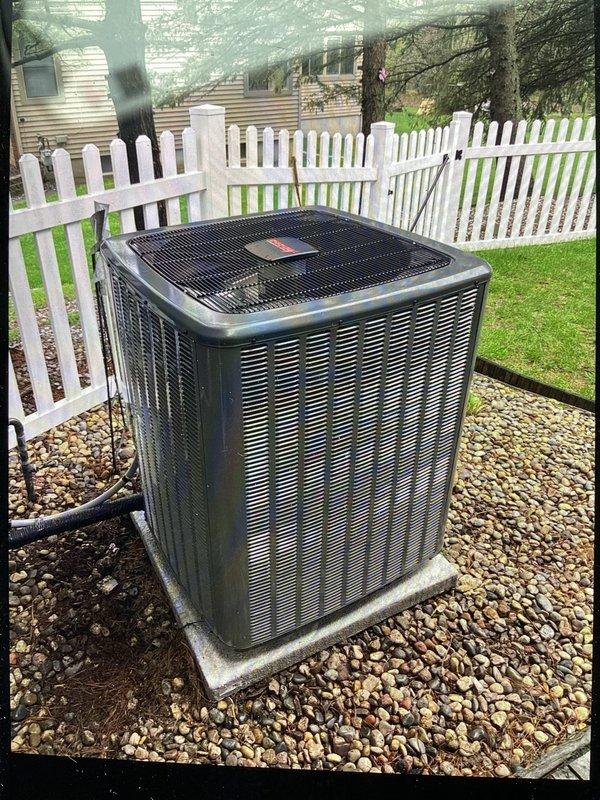 Completed full HVAC system installation including new furnace unit and outdoor air conditioning condenser. Installed Aprilaire whole-house humidifier with digital control panel, connected all ductwork and PVC condensate piping, and mounted exterior condenser unit on concrete pad with proper electrical connections. System tested and verified operational with all components functioning per manufacturer specifications.