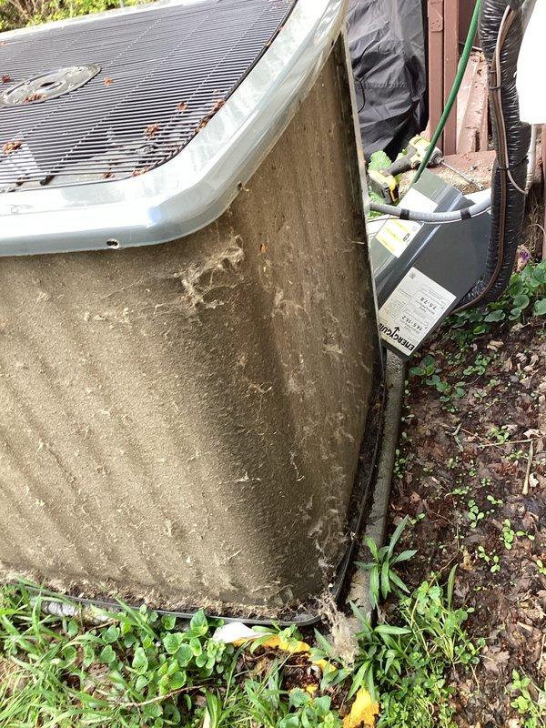 Responded to no cooling complaint where system was blowing warm air. Upon arrival, performed diagnostic evaluation of outdoor condenser unit and indoor air handler. Inspected both units for proper operation, checked refrigerant levels, and tested electrical components. Documented equipment condition with photos showing outdoor condenser unit with weathered exterior surfaces and debris accumulation on top grille. Verified system operation and identified root cause of cooling failure. Completed necessary repairs to restore proper cooling function and confirmed adequate airflow throughout system.