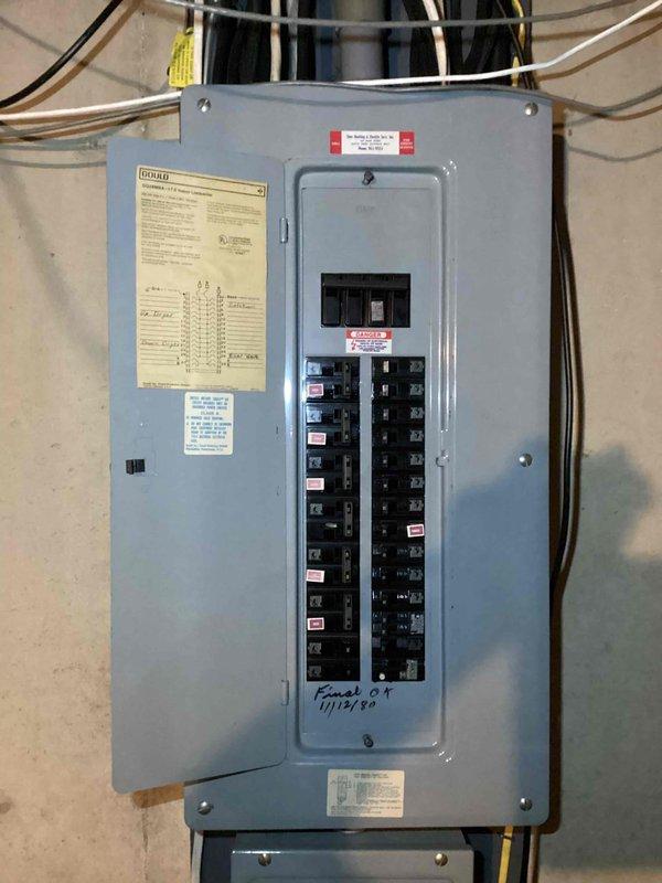 Conducted on-site evaluation for standby generator installation at residential property. Assessed existing electrical service panel configuration, photographed 200-amp main breaker panel with dual-column circuit breaker arrangement to determine load capacity and transfer switch integration requirements. Documented basement utility area conditions including available space for generator transfer switch installation, concrete block wall structure, and existing electrical conduit pathways. Evaluated panel accessibility and determined optimal routing for generator feed cables from exterior pad location to transfer equipment. Prepared comprehensive estimate for automatic standby generator system including equipment specifications, transfer switch requirements, and installation scope.