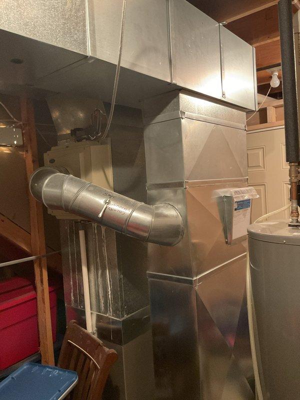 Completed annual heating maintenance on 2020 Carrier furnace model WT 10-2030 with humidifier system. Performed comprehensive tune-up including inspection of heat exchanger, burner assembly, and gas connections; verified proper operation of blower motor and tested all safety controls. Inspected PVC intake and exhaust venting system for proper termination and secure connections; checked condensate drain lines and verified trap functionality. Replaced air filter, evaluated humidifier operation, and confirmed all ductwork connections were secure throughout the basement installation. System operating within manufacturer specifications with no immediate concerns noted.