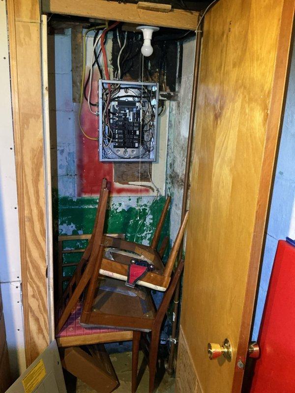Conducted electrical estimate for underground service line replacement between garage and main dwelling. Inspected existing electrical panel and wiring configuration in utility closet, documenting current circuit breaker arrangement and wire routing from panel to overhead junction points. Assessed condition of interior panel connections and identified wire pathways that connect to exterior underground feed. Evaluated scope of work required to excavate and replace deteriorated underground electrical line, including panel modifications and connection points at both structures. Provided comprehensive documentation through photographs of existing electrical infrastructure to support estimate for trenching, conduit installation, and new wire installation between buildings.