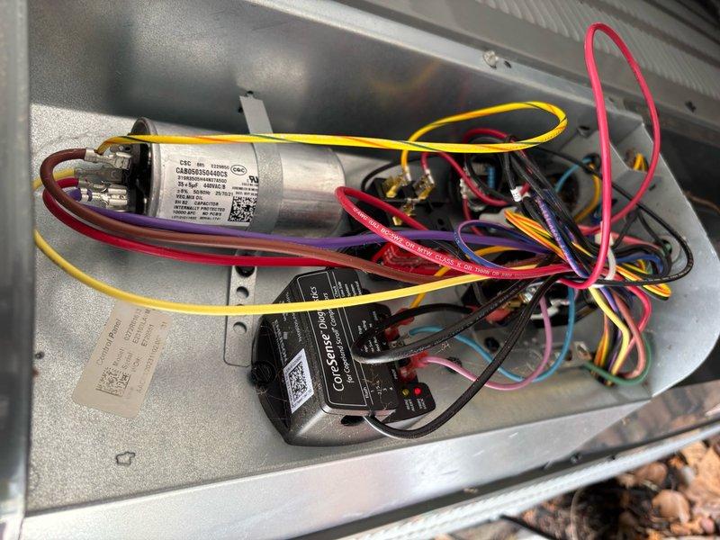 Completed annual cooling maintenance on 2021 EnergiAir system under 1-year warranty coverage. Performed comprehensive AC tune-up including inspection of capacitor, Observer control module, and all electrical connections within the condenser unit. All wiring connections, relay components, and control assemblies verified secure and functioning properly with no deficiencies noted.