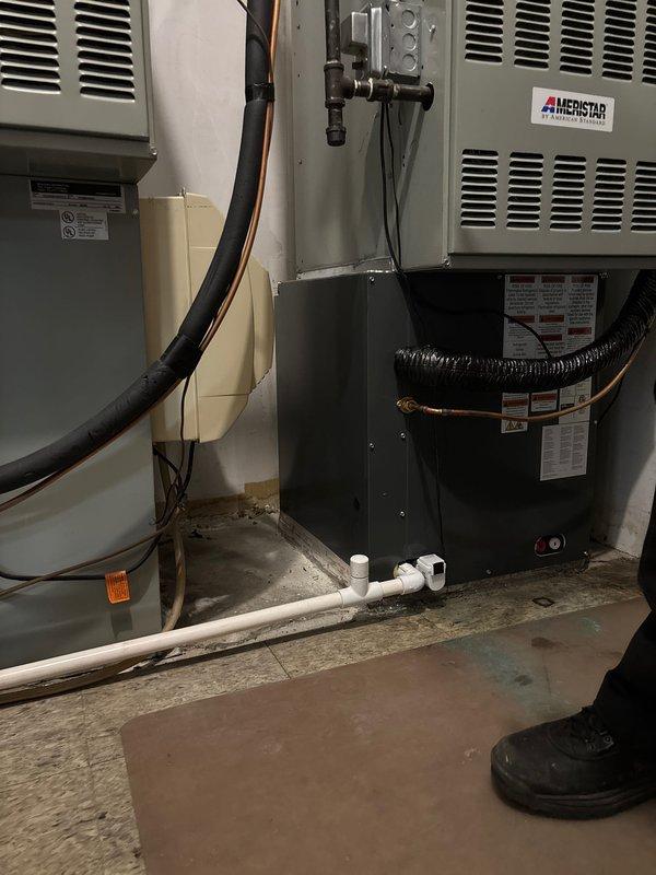 Completed full HVAC system replacement including outdoor Daikin condenser unit and indoor Ameristar air handler with associated ductwork and plenum assembly. Installed new refrigerant line set, condensate drain piping, electrical disconnects, and all necessary fittings and connections. System tested and verified operational, with all components properly mounted and secured per manufacturer specifications.