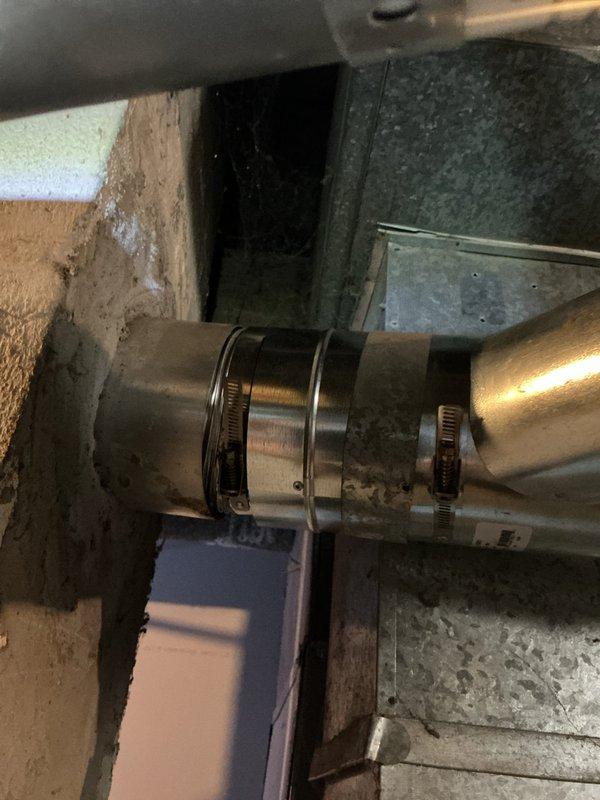 Replaced furnace exhaust pipe with new B-Vent piping and installed 5" B-Vent connector in place of existing common vent adapter to correct rental inspection findings. Water heater exhaust system was inspected and confirmed to be in acceptable condition, requiring no replacement. All venting components were properly secured with appropriate clamps and fittings to ensure safe exhaust operation.