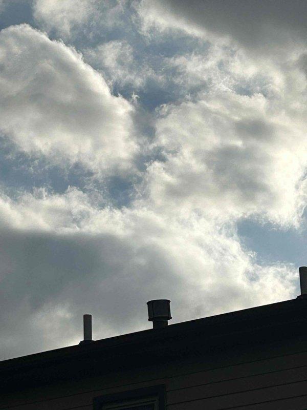 Responded to service call for water heater with water accumulation in drain pan and unit not operational. Upon inspection, discovered significant rust and corrosion on internal components including heat exchanger fins and metal housing panels, indicating prolonged moisture exposure and deterioration of critical components. Documented extensive rust damage with photographic evidence showing advanced corrosion on upper housing sections and rust streaking on ventilation panels. Due to severity of corrosion damage compromising unit integrity and safety, recommended immediate water heater replacement. Unit age and condition of deteriorated components determined repair to be unfeasible.