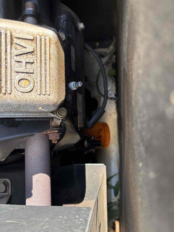Completed preventive maintenance tune-up on 19-year-old Generac standby generator system. Performed comprehensive inspection of engine components including DOHC valve cover assembly, exhaust system, fuel lines, and electrical connections. Inspected control panel, circuit breakers, and wiring harnesses for proper operation and secure connections. Verified OHV engine system functionality and checked all mounting hardware within wooden enclosure. Documented equipment condition through photos showing normal wear consistent with age and outdoor installation. Generator tested and operating within manufacturer specifications. Maintenance agreement renewed through 2026.