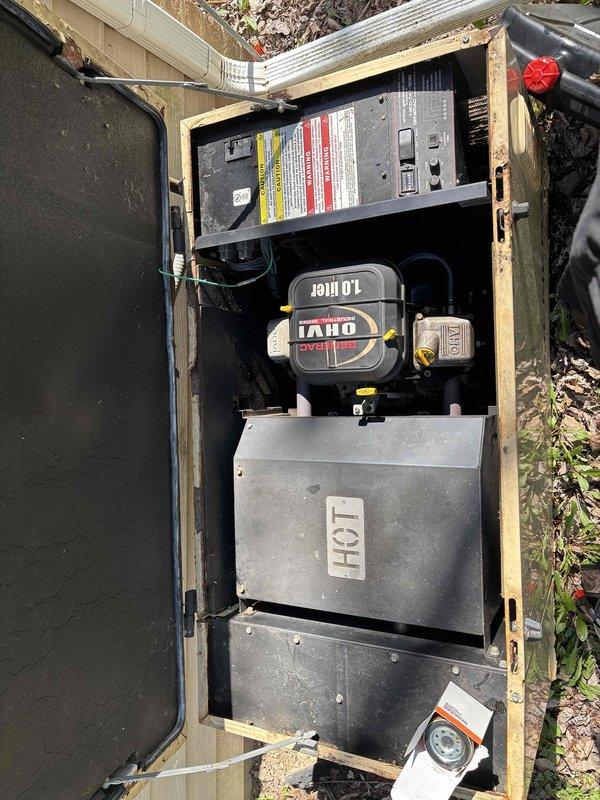 Completed preventive maintenance tune-up on 19-year-old Generac standby generator system. Performed comprehensive inspection of engine components including DOHC valve cover assembly, exhaust system, fuel lines, and electrical connections. Inspected control panel, circuit breakers, and wiring harnesses for proper operation and secure connections. Verified OHV engine system functionality and checked all mounting hardware within wooden enclosure. Documented equipment condition through photos showing normal wear consistent with age and outdoor installation. Generator tested and operating within manufacturer specifications. Maintenance agreement renewed through 2026.