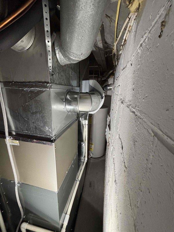 Completed full furnace installation in basement mechanical room, replacing existing unit with new high-efficiency system. Connected all ductwork, electrical wiring, and PVC venting to manufacturer specifications, ensuring proper airflow and system integration with existing HVAC infrastructure. Tested unit operation, verified all safety controls, and confirmed system functionality before completing installation.