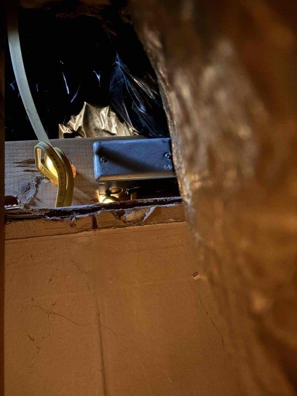 Responded to electrical short caused by HVAC technician earlier in the day. Accessed attic space, located affected electrical wiring and junction box near HVAC equipment, assessed damage to electrical circuits, and documented conditions with photographs. Verified electrical system integrity and ensured safe operation of circuits following the incident.