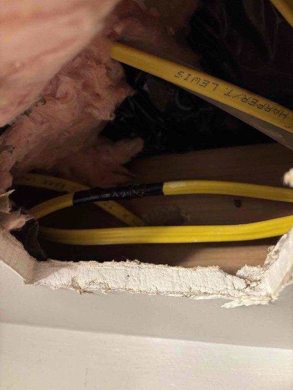 Responded to electrical short caused by HVAC technician earlier in the day. Accessed attic space, located affected electrical wiring and junction box near HVAC equipment, assessed damage to electrical circuits, and documented conditions with photographs. Verified electrical system integrity and ensured safe operation of circuits following the incident.