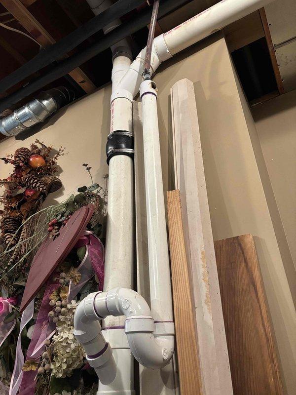 Completed comprehensive tune-up service on dual water heater system with both units exceeding 10 years of age. Performed standard maintenance procedures including inspection of all plumbing connections, copper piping, brass fittings, gas line connections, temperature and pressure relief valves, and Honeywell control unit. Verified proper operation of circulation pump, checked all shut-off valves including red-handled isolation valve, and assessed overall system performance. Both water heaters were inspected for signs of leakage, corrosion, and sediment buildup. Provided customer with pricing information for water softener filtration system as requested.