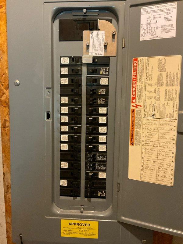 Conducted site assessment for electrical estimate to install an EV charger in the garage and add an additional outdoor outlet. Evaluated existing electrical panel capacity and circuit availability in the basement utility area to determine feasibility of supporting the new 240V EV charging circuit and additional 120V outdoor receptacle. Documented current electrical infrastructure including main service panel configuration, available breaker spaces, and wire routing pathways through unfinished basement area to proposed installation locations.