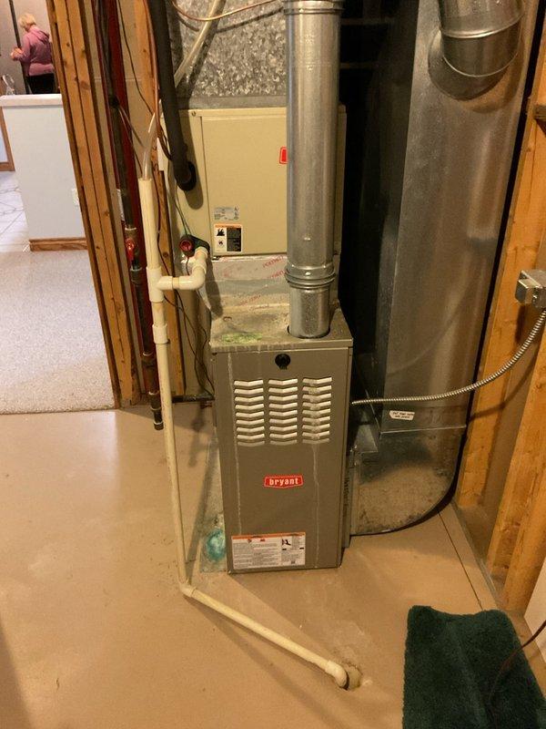 # No Cool Service Call

Responded to service call for 20-year-old central air conditioning system not cooling while heating function remained operational. Upon arrival, performed diagnostic testing on outdoor condensing unit using Fluke 902FC clamp meter to measure electrical current and verify compressor operation. Readings indicated abnormal amperage draw, suggesting potential compressor or electrical component failure.

Inspected indoor Bryant furnace and air handler system in basement utility area to verify proper thermostat communication and indoor blower operation. Confirmed heating mode functioning correctly, isolating issue to outdoor cooling components. Evaluated electrical connections at outdoor unit junction box, checking multiple wire connections and voltage supply to compressor and condenser fan motor.

Given the age of the equipment at 20 years and diagnostic findings indicating major component failure, discussed system condition and repair versus replacement options. Doc